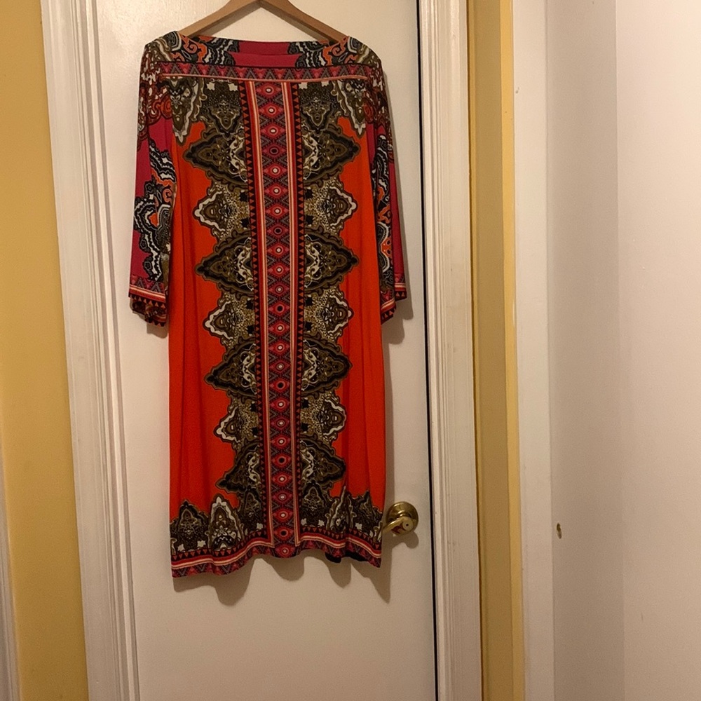 Orange dress never worn, size 14
